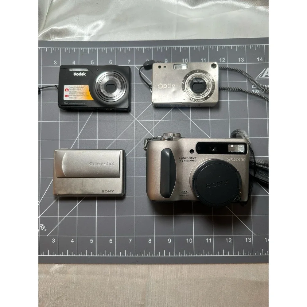 Lot Of 4! For Parts Only Ditigal Cameras Sony CyberShot Kodak M1033 Pentax Optio